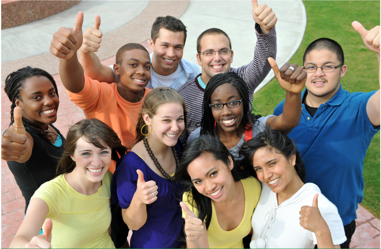 group of diverse students giving thumbs up